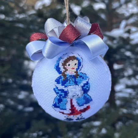 Christmas ornament Little girl in a blue coat