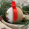 Weihnachtskugel Junge auf Schlitten