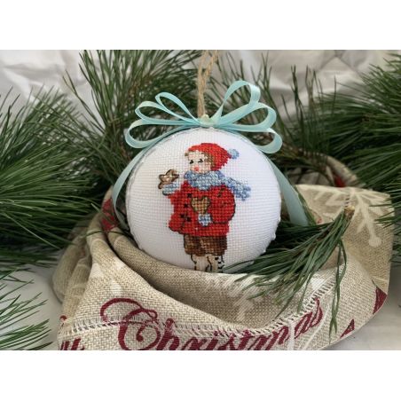 Christmas ornament Little girl with a gingerbread star