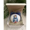 Christmas ornament Little girl in a blue coat